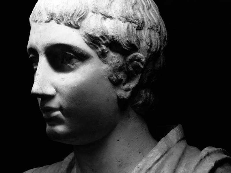 Portrait of a statue of a man in an exposition inside Palazzo Tè at Mantova.